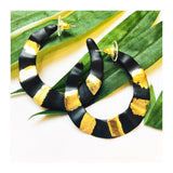 Black Wavy Resin Hoops with Painted Metallic Gold Accents