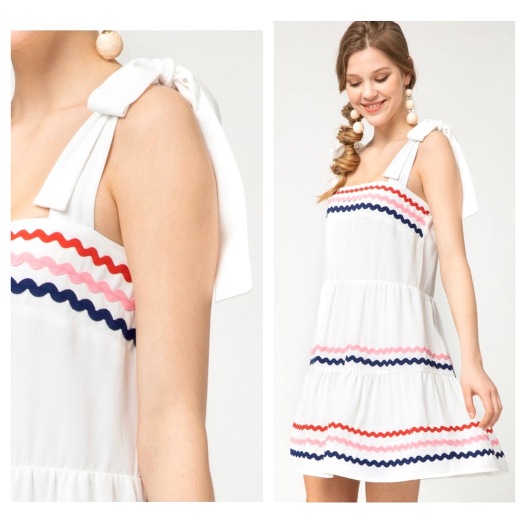 White Tie Shoulder Drop Hem Dress with Red Blue & Pink Ric Rac