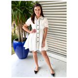 White Ruffled Puff Sleeve A-Line Dress with Black Wavy Embroidered Trim
