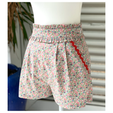 Pink Blue Green Floral Smocked Ruffle Waist Shorts with Red Ric Rac Pocket Trim